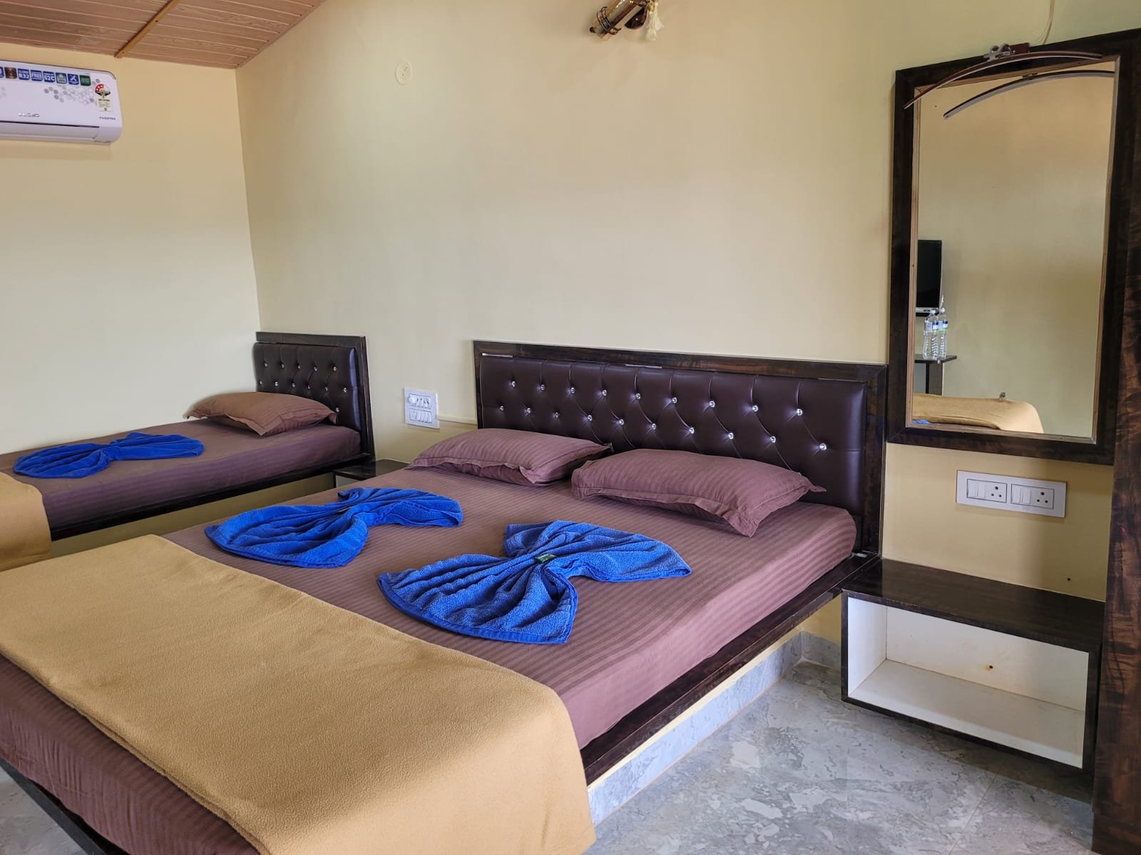 Prepared beds inside a guest room